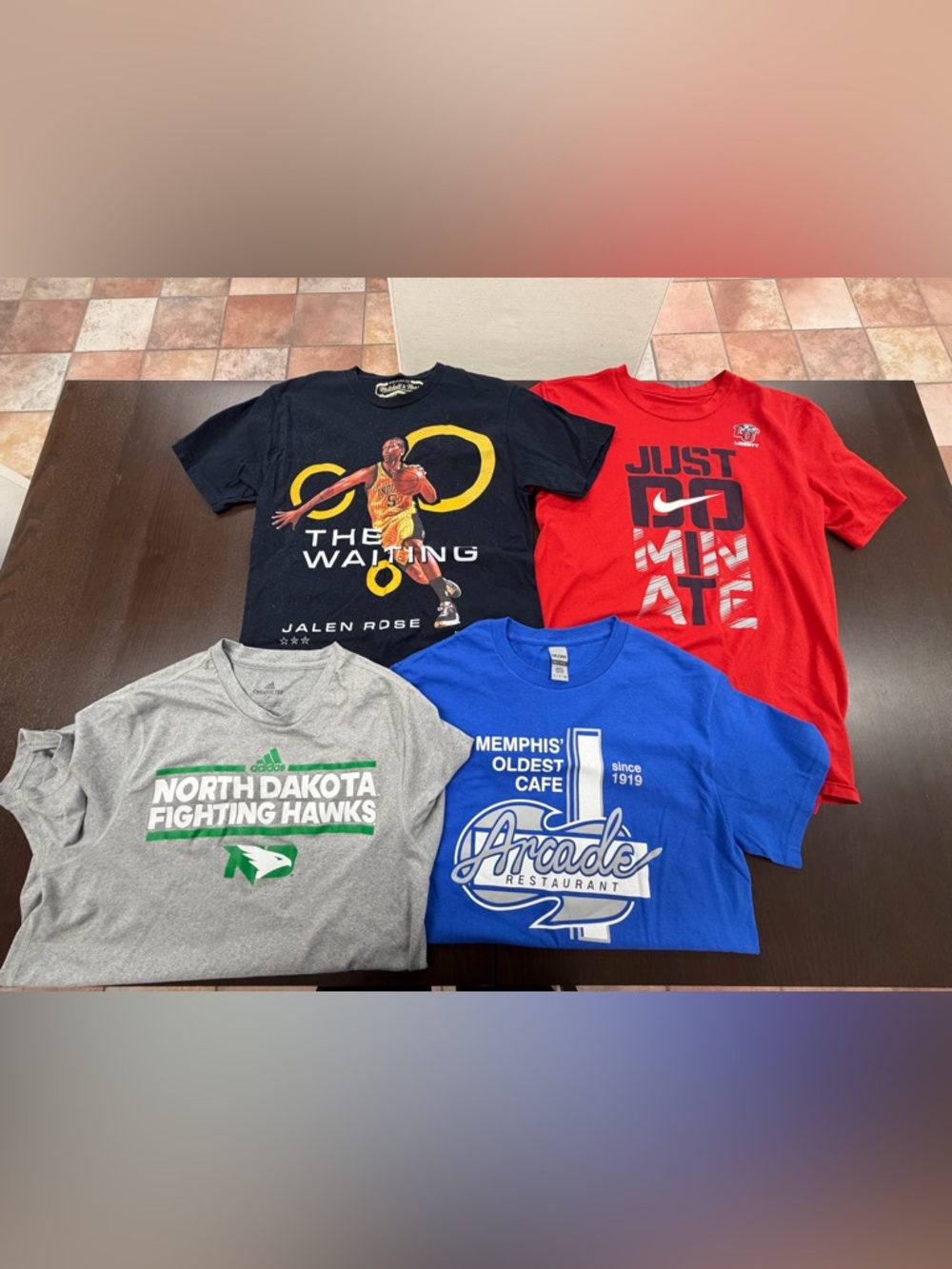 Four small tee shirts